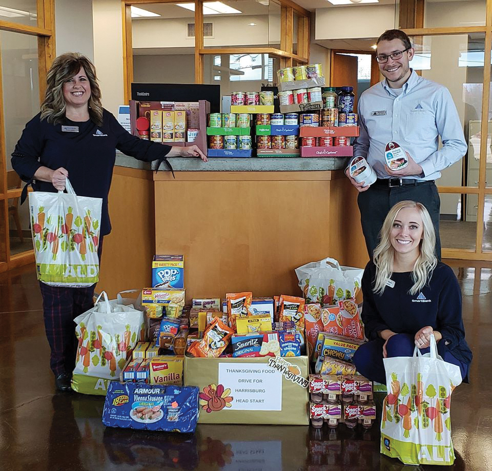 SmartBank team volunteering at a community event for a charitable cause